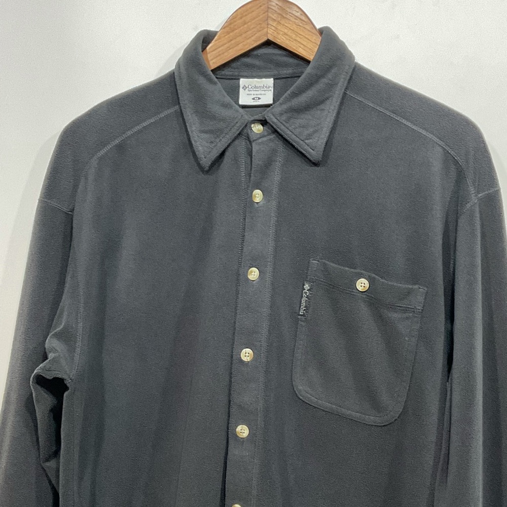 Columbia black shirt button up long-sleeve 100% polyester. Gently used; Size Med